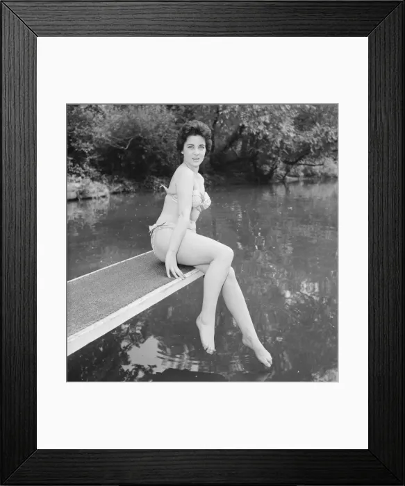 Framed Print : Model Barara Joyce seen here at the local lido modelling the latest beach wear Framed Print : Model Barara Joyce seen here at the local lido modelling the latest beach wear