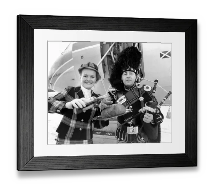 Framed Print : Pipe Major Ian Nelson braved the bitter weather to don his uniform