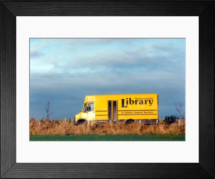 Framed Print : Mike Yorke, Senior Library Assistant on his round with the mobile library in rural Framed Print : Mike Yorke, Senior Library Assistant on his round with the mobile library in rural