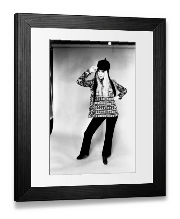 Framed Print : A fashion shoot from 13 April 1970 - A model wears a kaftan and trousers Framed Print : A fashion shoot from 13 April 1970 - A model wears a kaftan and trousers