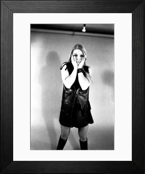 Framed Print : A fashion shoot from 13 April 1970 - A model wears a dress with knee lenght boots Framed Print : A fashion shoot from 13 April 1970 - A model wears a dress with knee lenght boots