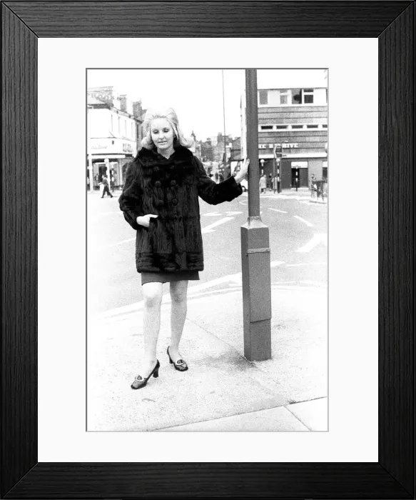Framed Print : A fashion shoot from 2 May 1970 - A model wears a fur coat