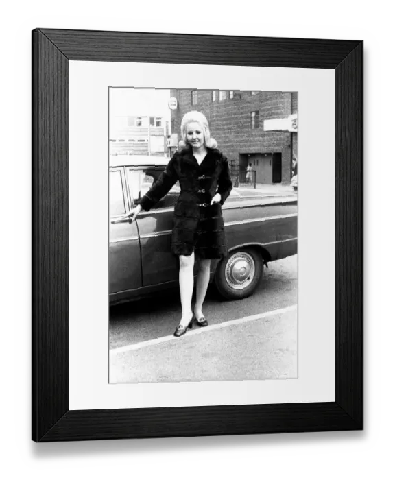 Framed Print : A fashion shoot from 2 May 1970 - A model wears a fur coat