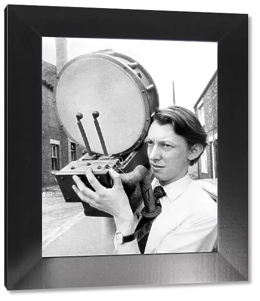 Mr. John Heslop with part of the percussion fitments that form part of a pre-war theatre