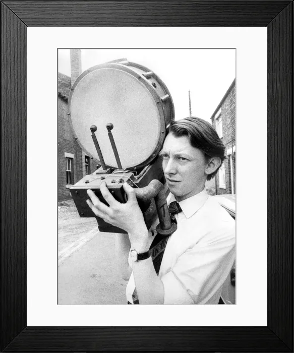 Framed Print : Mr. John Heslop with part of the percussion fitments that form part of a pre-war theatre Framed Print : Mr. John Heslop with part of the percussion fitments that form part of a pre-war theatre