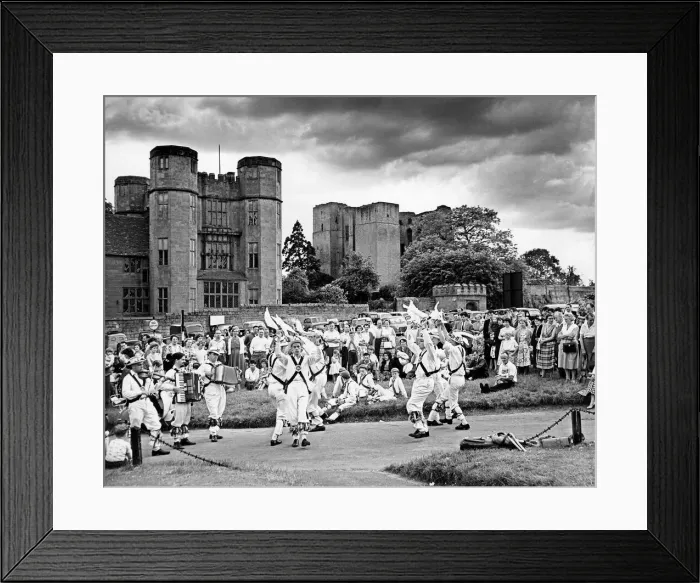Framed Print : Morris dancers from Coventry giving a display on the green outside Kenilworth Castle Framed Print : Morris dancers from Coventry giving a display on the green outside Kenilworth Castle
