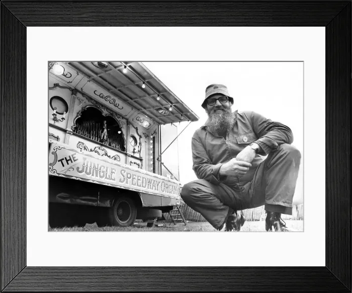 Framed Print : Mr. Alan Cobb with on of the countrys oldest fairground organs on show Framed Print : Mr. Alan Cobb with on of the countrys oldest fairground organs on show
