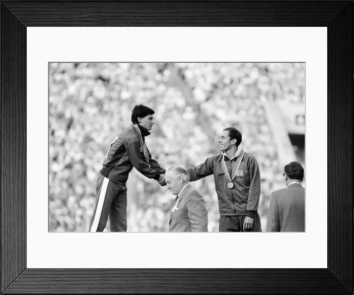 Framed Print : Sebastian Coe stands on podium during medal ceremony after Mens 1500 metres final Framed Print : Sebastian Coe stands on podium during medal ceremony after Mens 1500 metres final