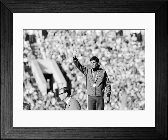 Framed Print : Sebastian Coe acknowledges crowd during medal ceremony after Mens 1500 metres final Framed Print : Sebastian Coe acknowledges crowd during medal ceremony after Mens 1500 metres final