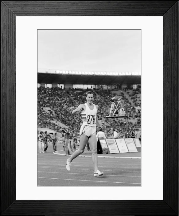 Framed Print : Middle distance runner Steve Ovett celebrates after winning a gold medal in the Men Framed Print : Middle distance runner Steve Ovett celebrates after winning a gold medal in the Men