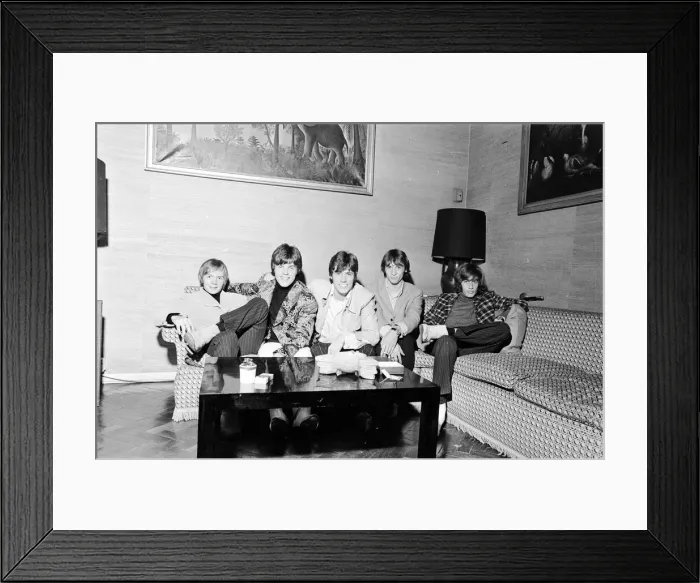Framed Print : The Bee Gees seen here watching television in their hotel room 17th October 1967