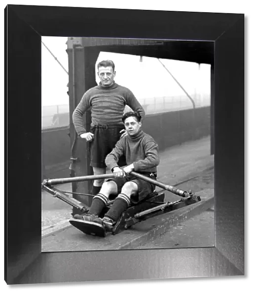 Clapton Orient F. C. Mills and Edmonds training on a rowing machine. DM17214. D c