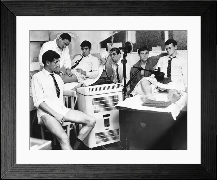 Framed Print : Harry Meadows the Trainer for Chelsea FC 1965 treats Terry Venables
