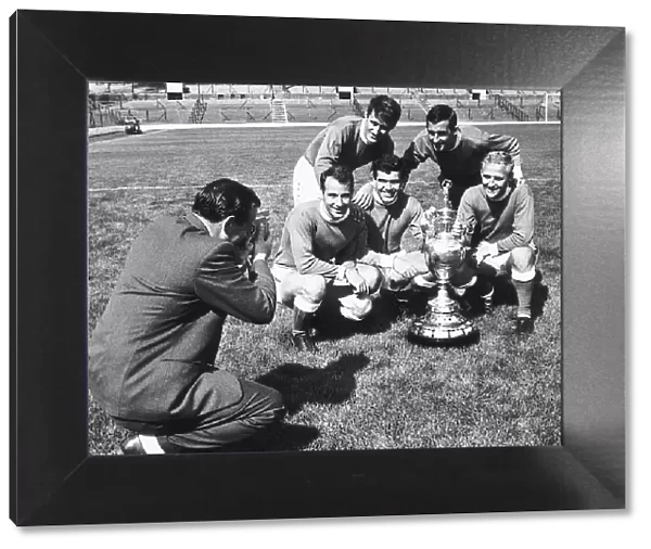 Harry Catterick manager of Everton football Club filming some of his players with