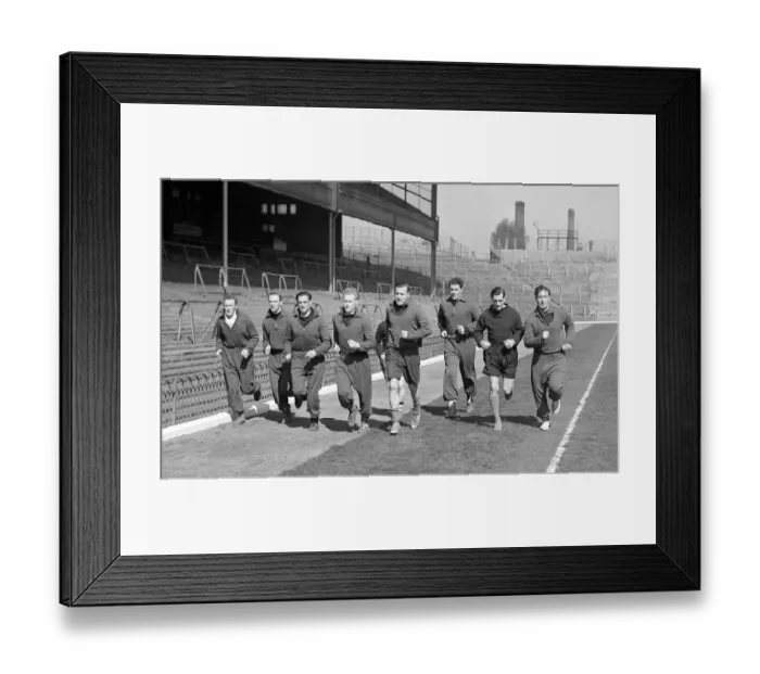 Framed Print : Arsenal Football Club April 1950 Arsenal players train in front of the main east Framed Print : Arsenal Football Club April 1950 Arsenal players train in front of the main east