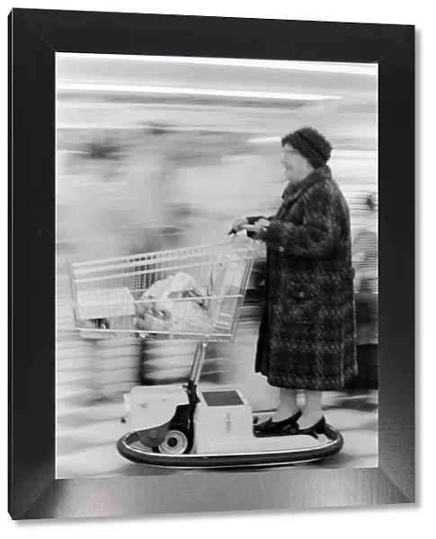 New electric shopping trolley at Tesco, Wandsworth. Pensioner Mrs Edith Dudman