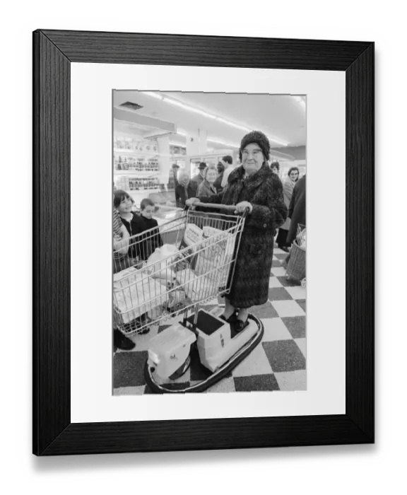 Framed Print : New electric shopping trolley at Tesco, Wandsworth. Pensioner Mrs Edith Dudman Framed Print : New electric shopping trolley at Tesco, Wandsworth. Pensioner Mrs Edith Dudman
