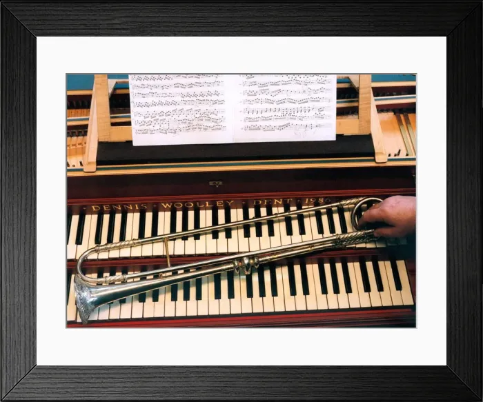 Framed Print : A seventeenth century trumpet replica on the keyboard of a harpsichord Framed Print : A seventeenth century trumpet replica on the keyboard of a harpsichord