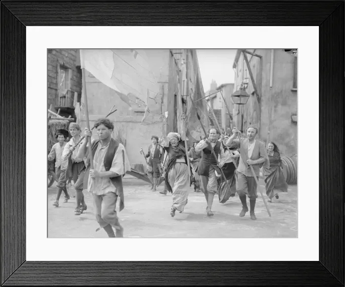 Framed Print : Rita Tobin (centre) seen here as a a film extra re enacting the storming of the Bastille Framed Print : Rita Tobin (centre) seen here as a a film extra re enacting the storming of the Bastille