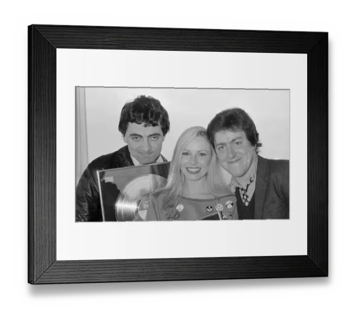 Framed Print : Griff Rhys Jones with fellow comedians Rowan Atkinson and Pamela Stephenson all receiving