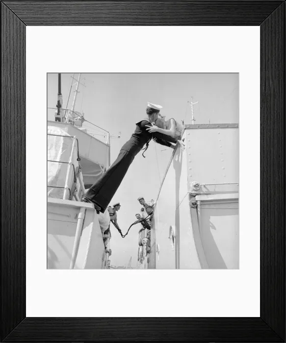 Framed Print : Twenty year old Engineer Mechanic Alan Purton of the Royal Navy stretches across the gap Framed Print : Twenty year old Engineer Mechanic Alan Purton of the Royal Navy stretches across the gap