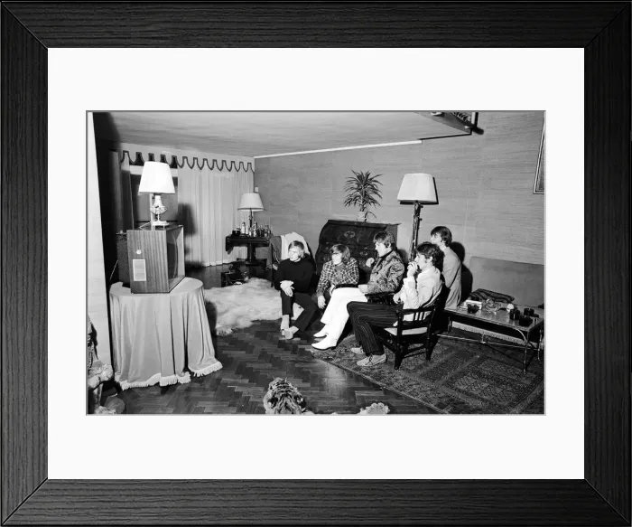 Framed Print : The Bee Gees seen here watching television in their hotel room 17th October 1967