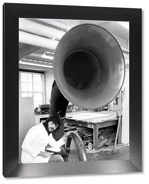 Museum technician Richard Miller was to knock out the dents in this giant auyetephone