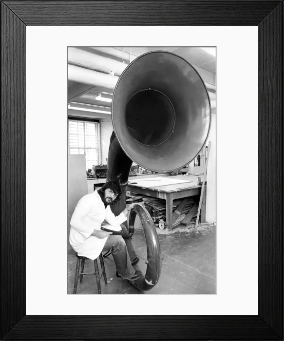 Framed Print : Museum technician Richard Miller was to knock out the dents in this giant auyetephone Framed Print : Museum technician Richard Miller was to knock out the dents in this giant auyetephone