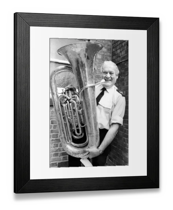 Framed Print : Police Sergt. Andy Chicken with tubby the tuba which was left behind at Ashington Hirst Framed Print : Police Sergt. Andy Chicken with tubby the tuba which was left behind at Ashington Hirst