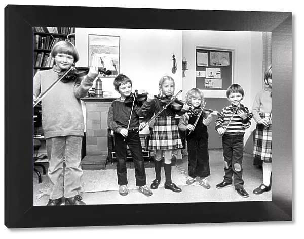 Young violinists getting in some practice in October 1982