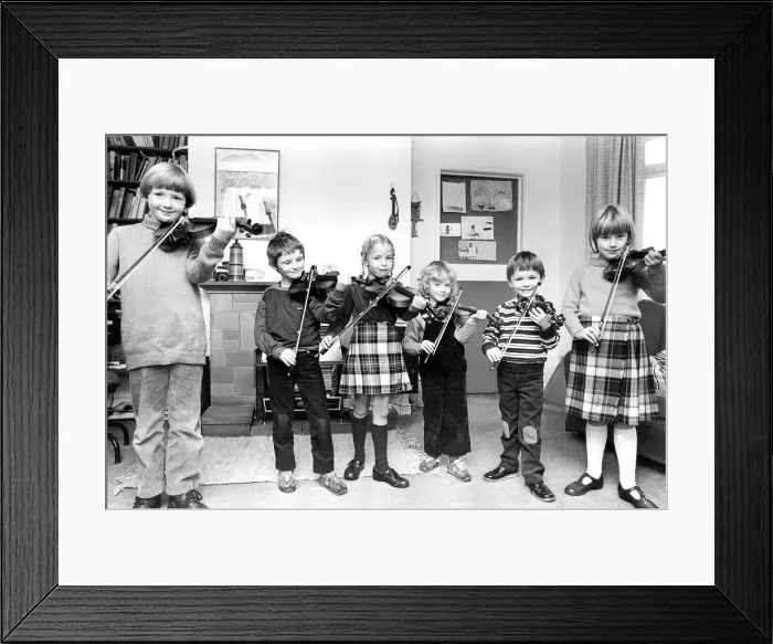 Framed Print : Young violinists getting in some practice in October 1982 Framed Print : Young violinists getting in some practice in October 1982