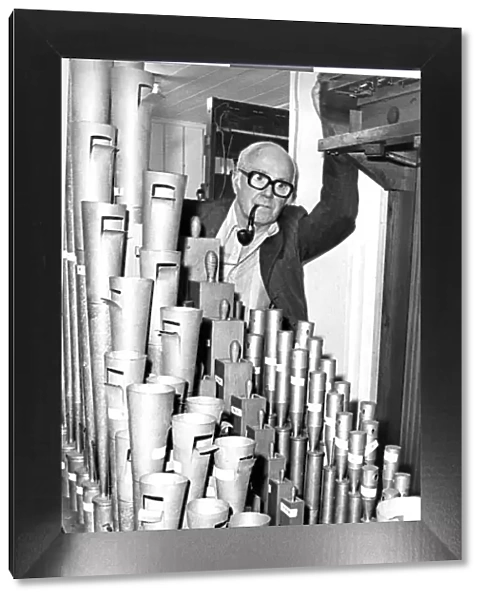 George Blake of the Cleveland Organ Society with the trumpet pipes of the Wurlitzer organ
