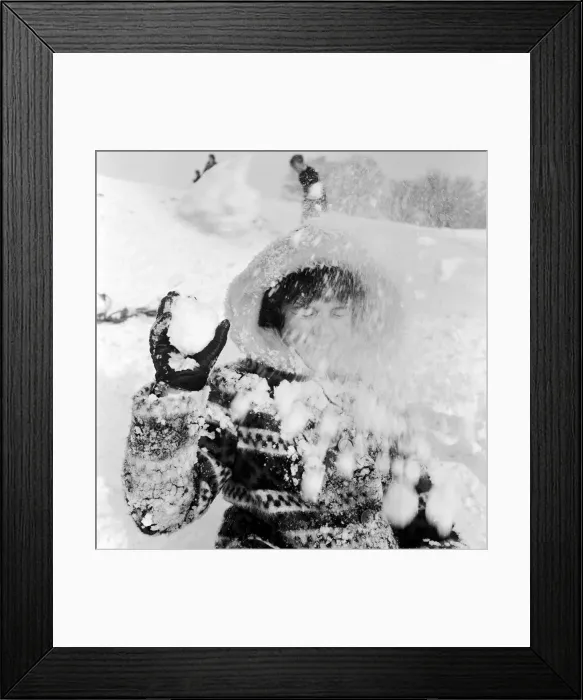 Framed Print : Snowball fight on Hampstead Heath. Louisa Lever and friend exchange snowballs Framed Print : Snowball fight on Hampstead Heath. Louisa Lever and friend exchange snowballs