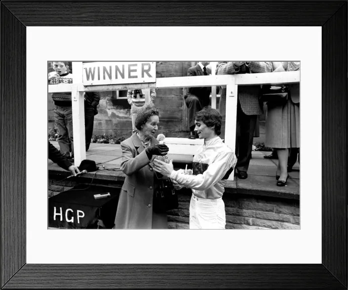 Framed Print : Jockey Walter Swinburn receives a winners trophy at Gosforth Park Racecourse, Newcastle