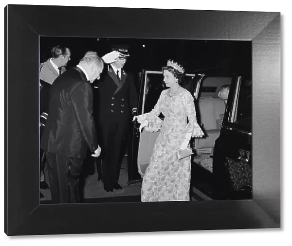 Her Majesty Queen Elizabeth II, is greeted by Media mogul Lew Grade (left)