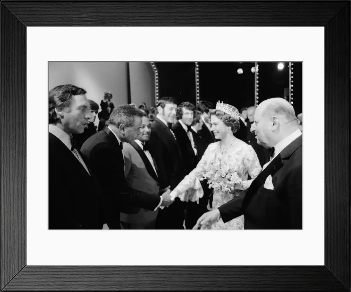 Framed Print : Her Majesty Queen Elizabeth II, escorted by Media mogul Lew Grade (right)