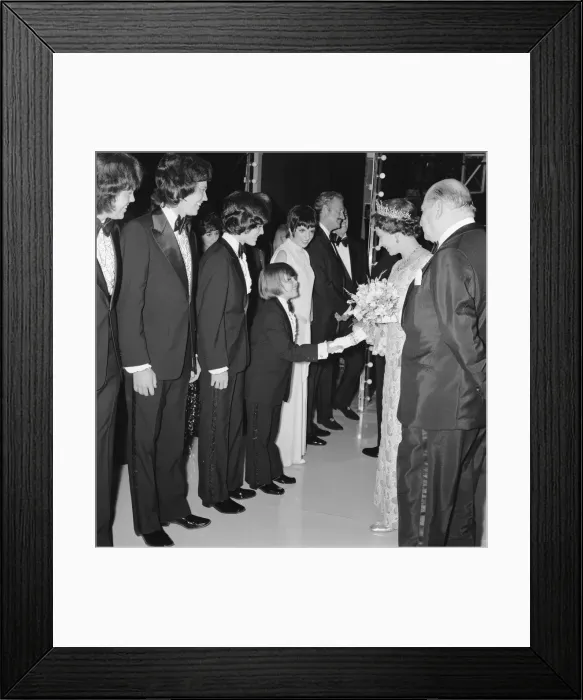 Framed Print : Her Majesty Queen Elizabeth II, escorted by Media mogul Lew Grade (right) Framed Print : Her Majesty Queen Elizabeth II, escorted by Media mogul Lew Grade (right)