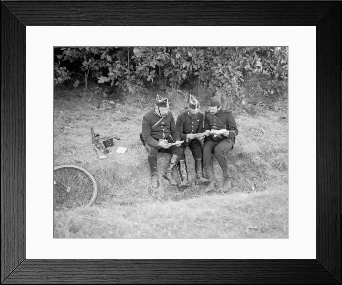 Framed Print : Belgian soldiers consort their maps as the German army advances through Belgium Framed Print : Belgian soldiers consort their maps as the German army advances through Belgium