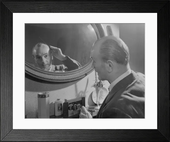 Framed Print : Male Grooming. Mr Frank Hancock seen here combing his hair Framed Print : Male Grooming. Mr Frank Hancock seen here combing his hair