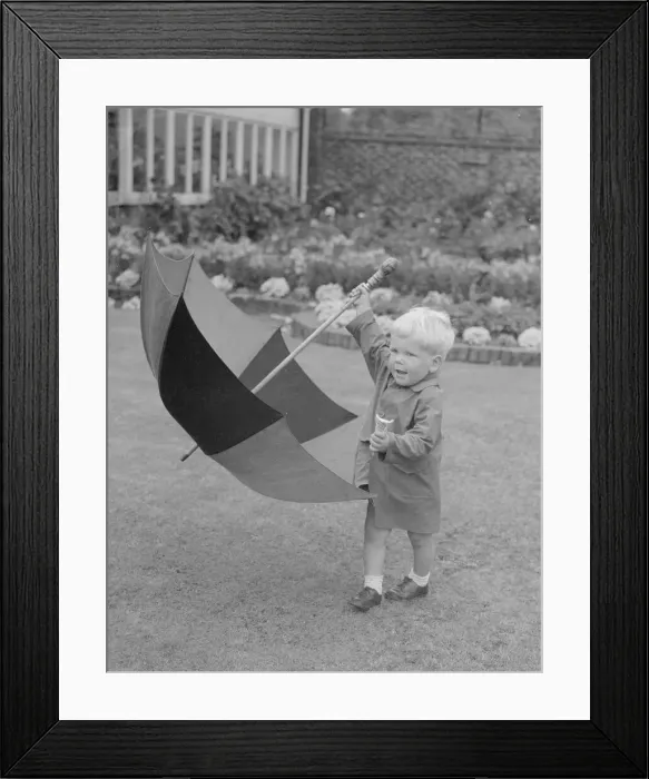 Framed Print : Two year old Angus Cameron seen here with umbrella and his ice cream cone Framed Print : Two year old Angus Cameron seen here with umbrella and his ice cream cone