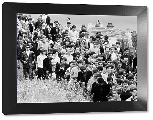 Mods seen here roaming the cliffs at the back of Hastings. 3rd August 1964