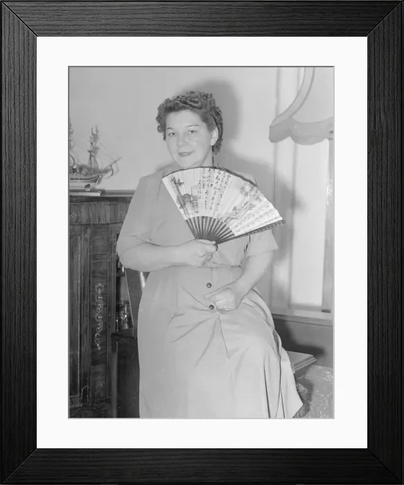 Framed Print : Woman fanning herself 1st August 1953 Mrs Irene Evans Local Caption Framed Print : Woman fanning herself 1st August 1953 Mrs Irene Evans Local Caption