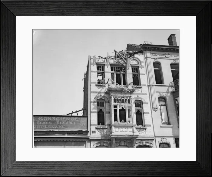 Framed Print : Damaged building in Antwerp the result of one of the three air raids made on the city by Framed Print : Damaged building in Antwerp the result of one of the three air raids made on the city by