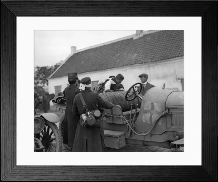 Framed Print : Injured Belgian soldiers seen here getting into a motor car prior to being transported Framed Print : Injured Belgian soldiers seen here getting into a motor car prior to being transported