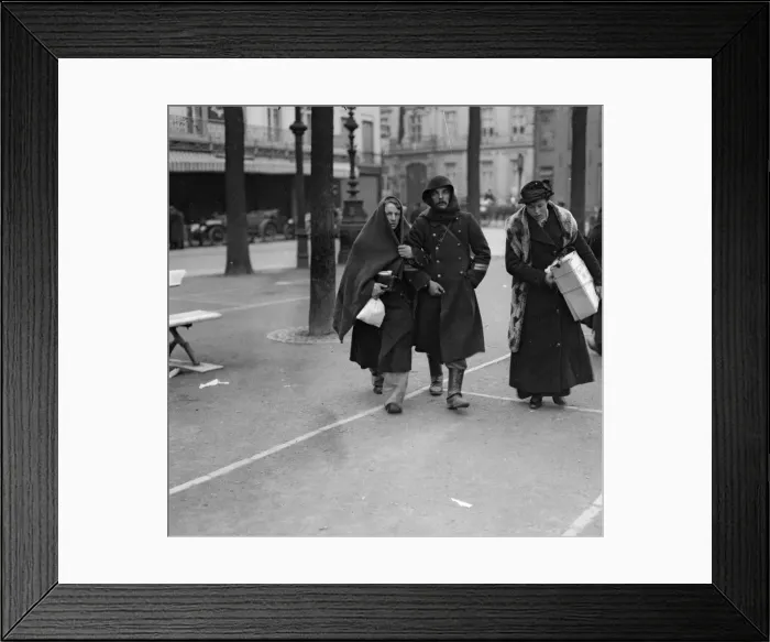 Framed Print : A wounded soldiers seen here being taken out of hospital