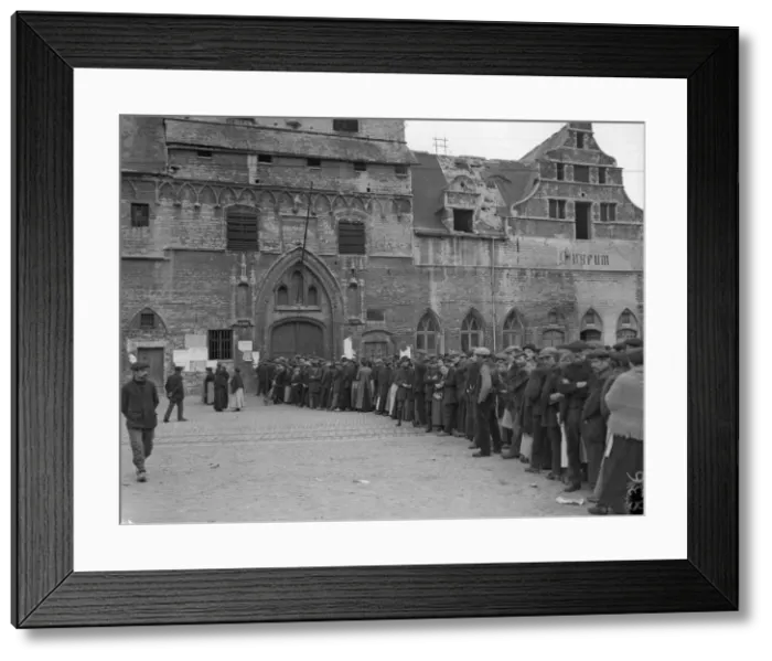 Framed Print : Refugees from the fighting seen here queuing outside the City Hall in Malines waiting for Framed Print : Refugees from the fighting seen here queuing outside the City Hall in Malines waiting for