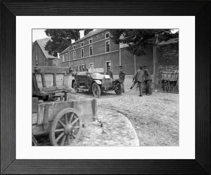 Framed Print : Officers showing their passes to Belgian peasants manning a road block on the road