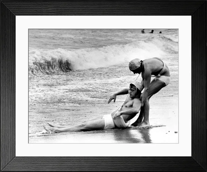 Framed Print : Two Competitors in the heats of the Nation Lifeguard Championship held on the South