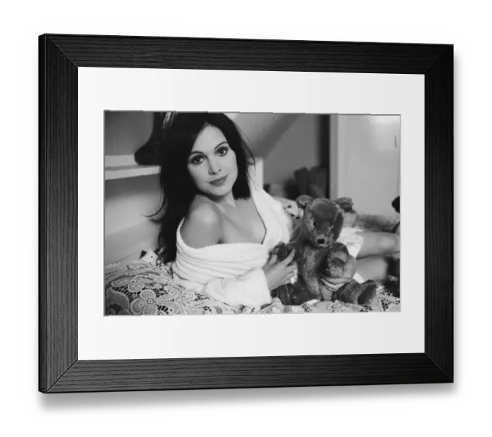 Framed Print : Actress Madeline Smith poses on the bed with her teddy bears. 2nd November 1973 Framed Print : Actress Madeline Smith poses on the bed with her teddy bears. 2nd November 1973
