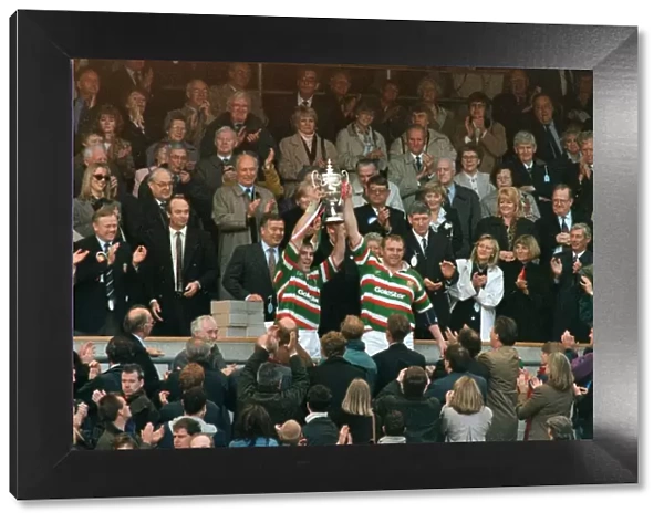 Leicesters Dean Richards holds up the Pilkington Trophy at Twickenham May 10